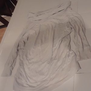 A turtle neck, forarm sleeved.